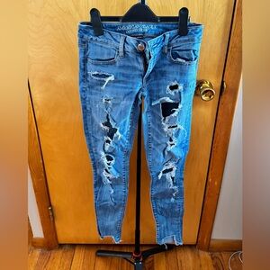 American Eagle Outfitters Women's Ripped Light Blue Super Low Skinny Jeans